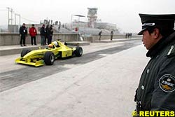 Snow Hampers Minardi's 'Thunder in China'