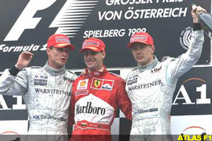 Coulthard, Irvine and Hakkinen on the podim