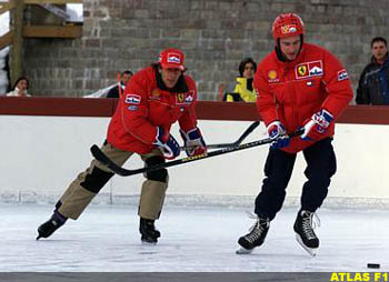 Irvine plays hockey with Luca Badoer