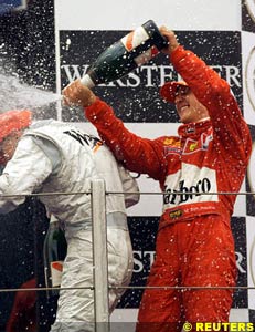 Schumacher jumps on the podium, today