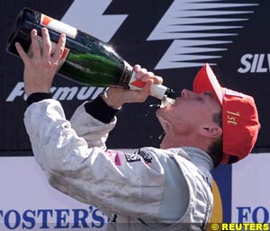 Coulthard celebrates his victory