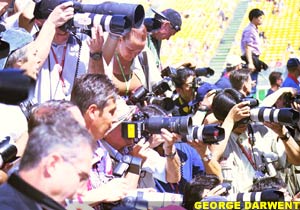 Photographers cram up at Melbourne