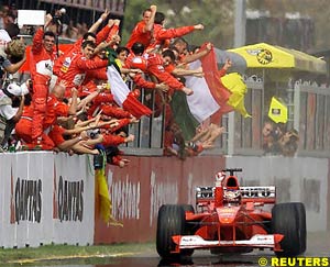 Ferrari team rejoice in Schumacher's win