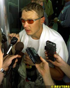 Hakkinen faces the press, today