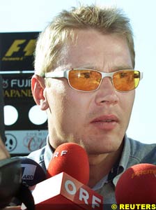 Hakkinen faces the press