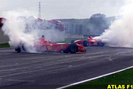 Barrichello and Schumacher burn rubber