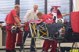 Toyota mechanics work on the car in Cologne