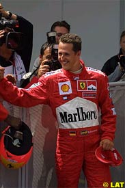 Michael Schumacher celebrates his pole, today