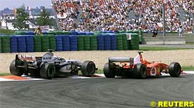 Schumacher overtakes Raikkonen