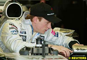 Raikkonen prepares for practice, this morning