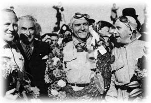 Nino Farina wins the British GP