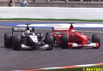 Coulthard gets past Schumacher